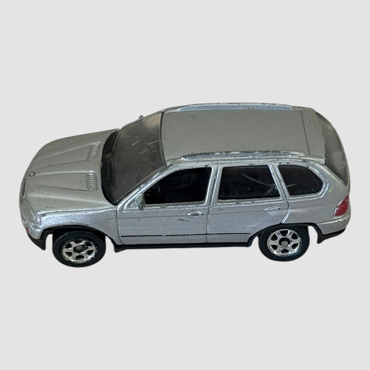 BMW X5 prateado miniatura Welly 1:64