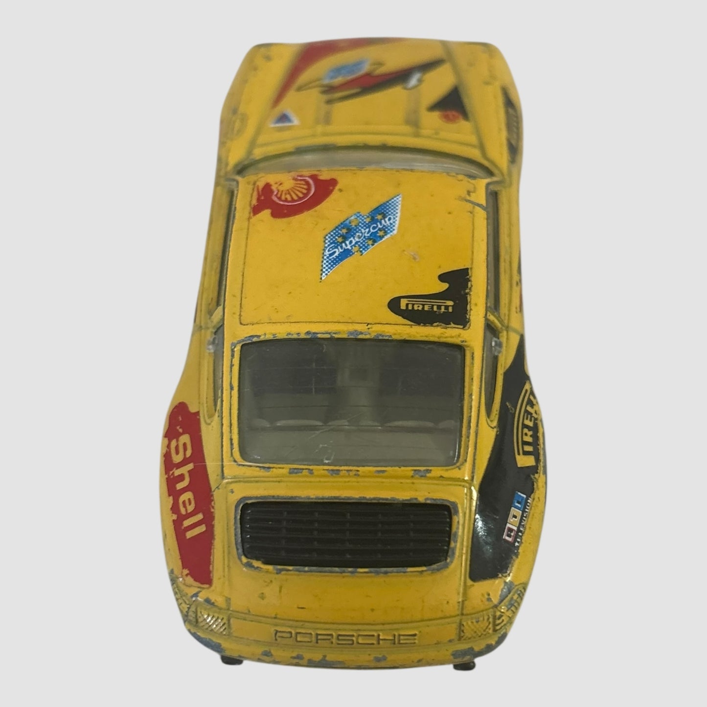 Bburago Porsche 911 Carrera miniatura amarela Shell
