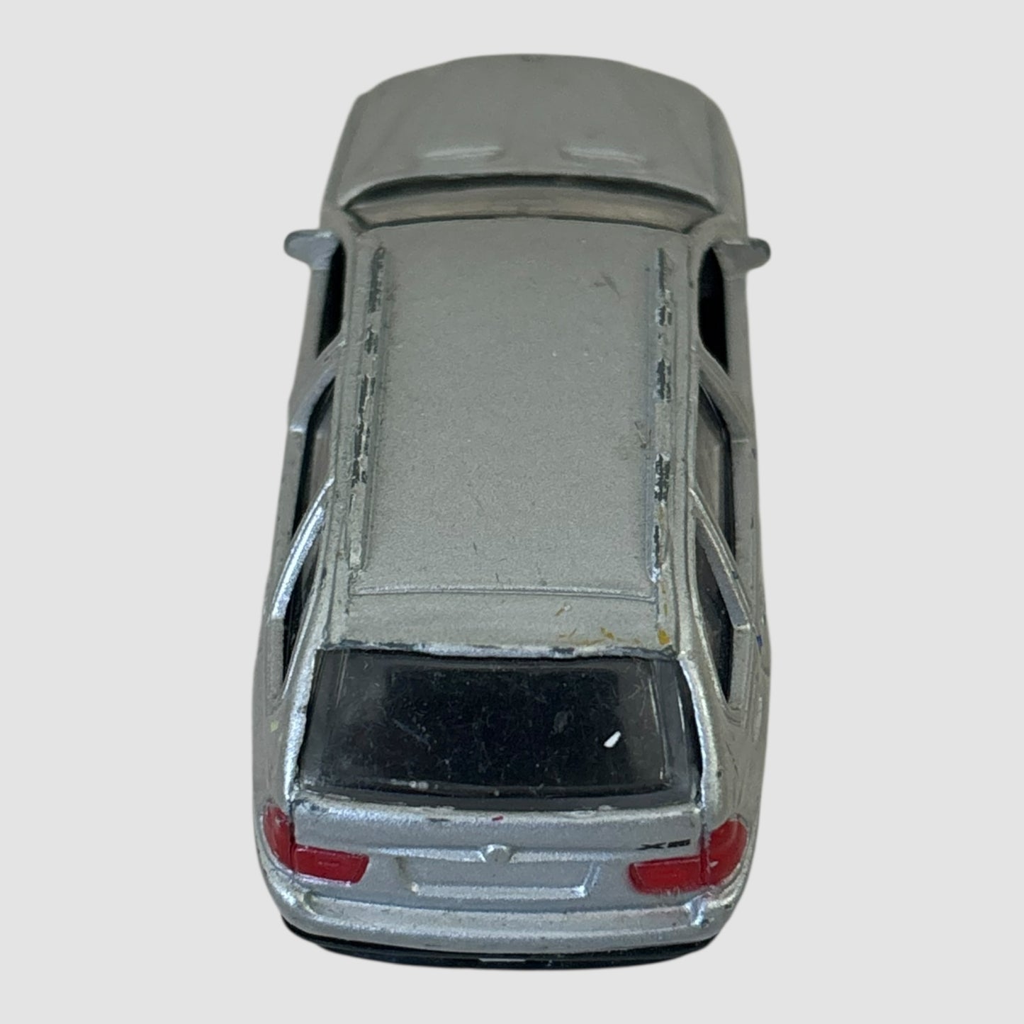 BMW X5 prateado miniatura Welly 1:64