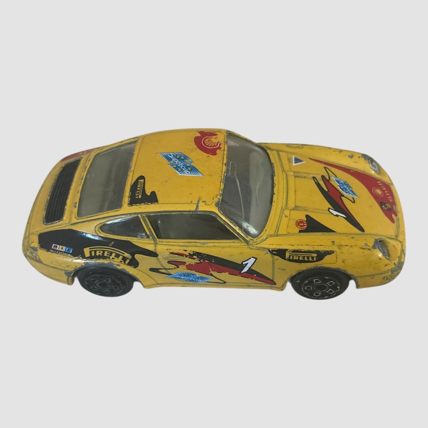 Bburago Porsche 911 Carrera miniatura amarela Shell