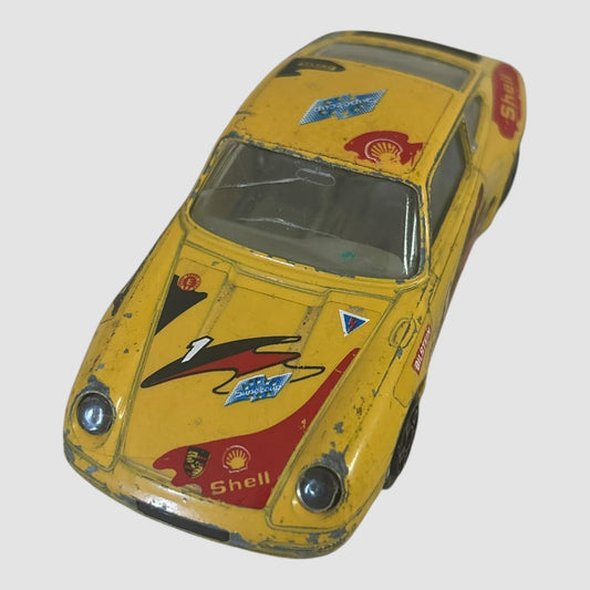 Bburago Porsche 911 Carrera miniatura amarela Shell