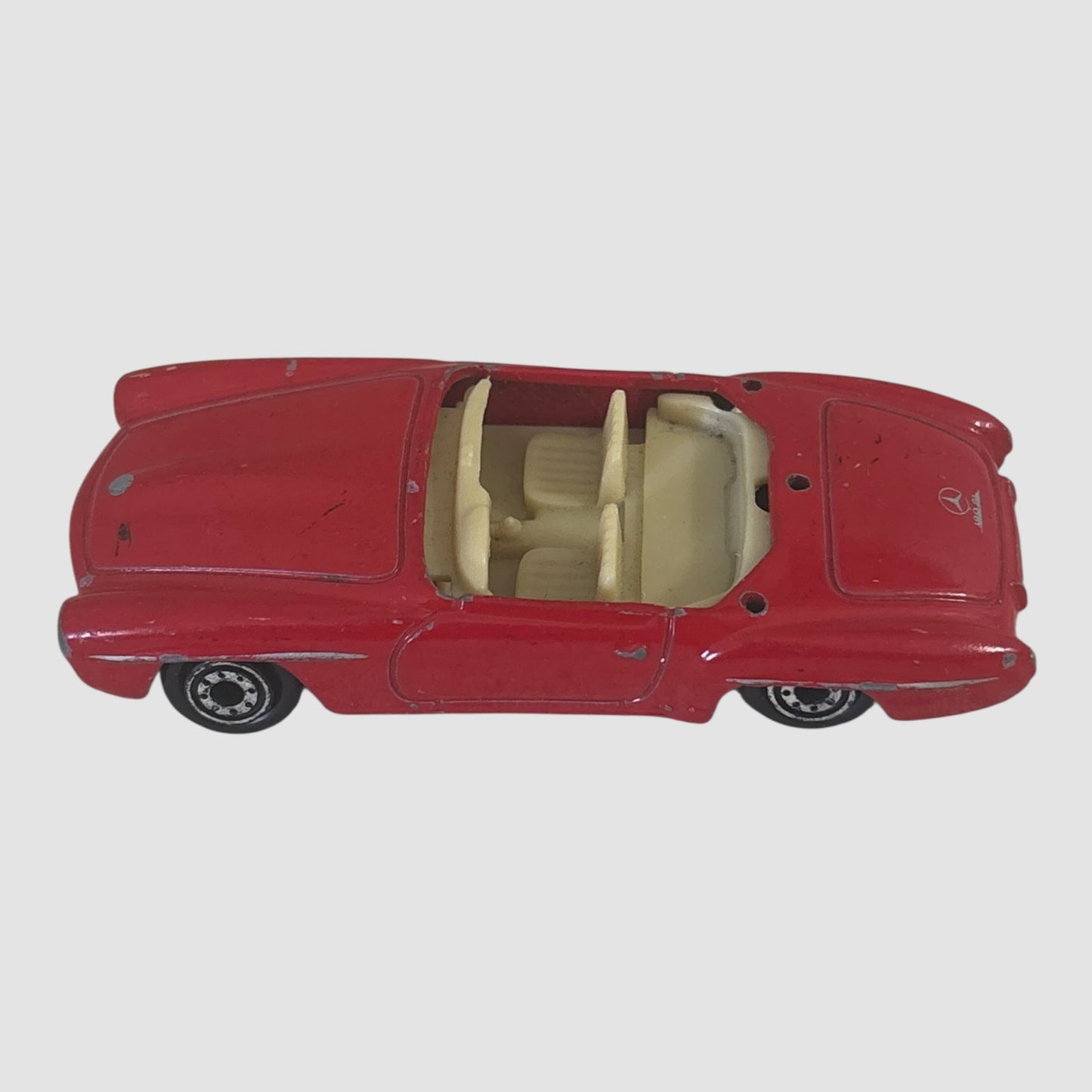 Miniatura carro descapotável clássico vermelho Welly