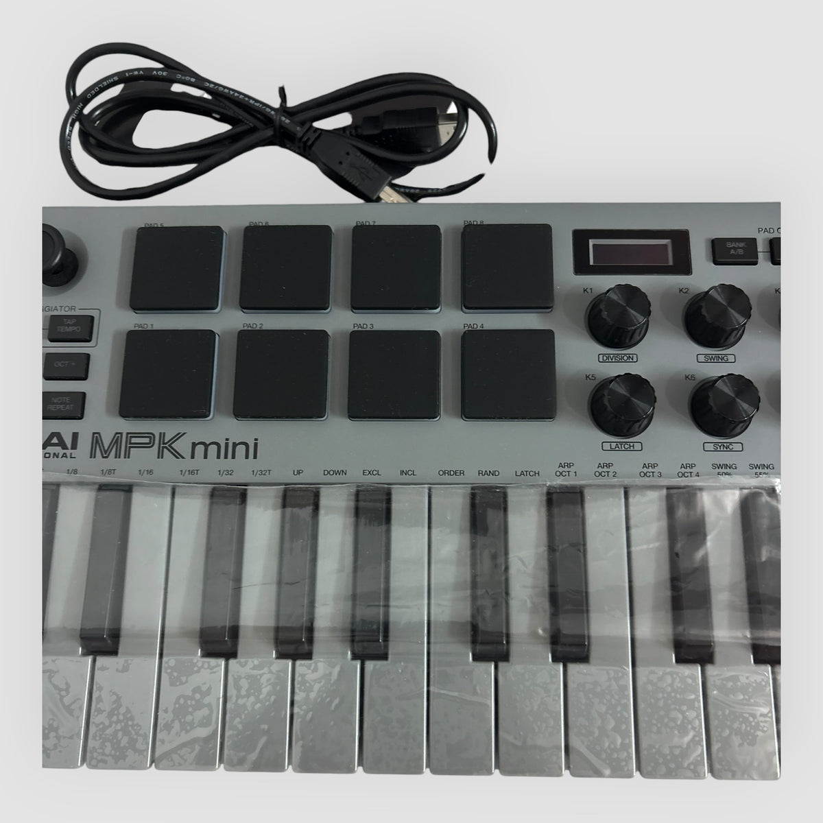 Teclado midi AKAI Professional MPK Mini MK3 – Special Edition Grey – Cinzento – Novo