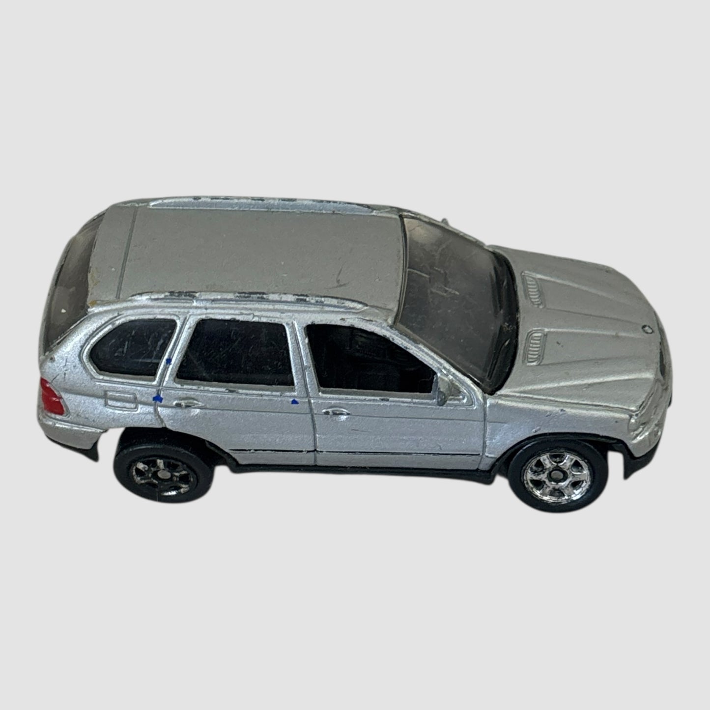 BMW X5 prateado miniatura Welly 1:64