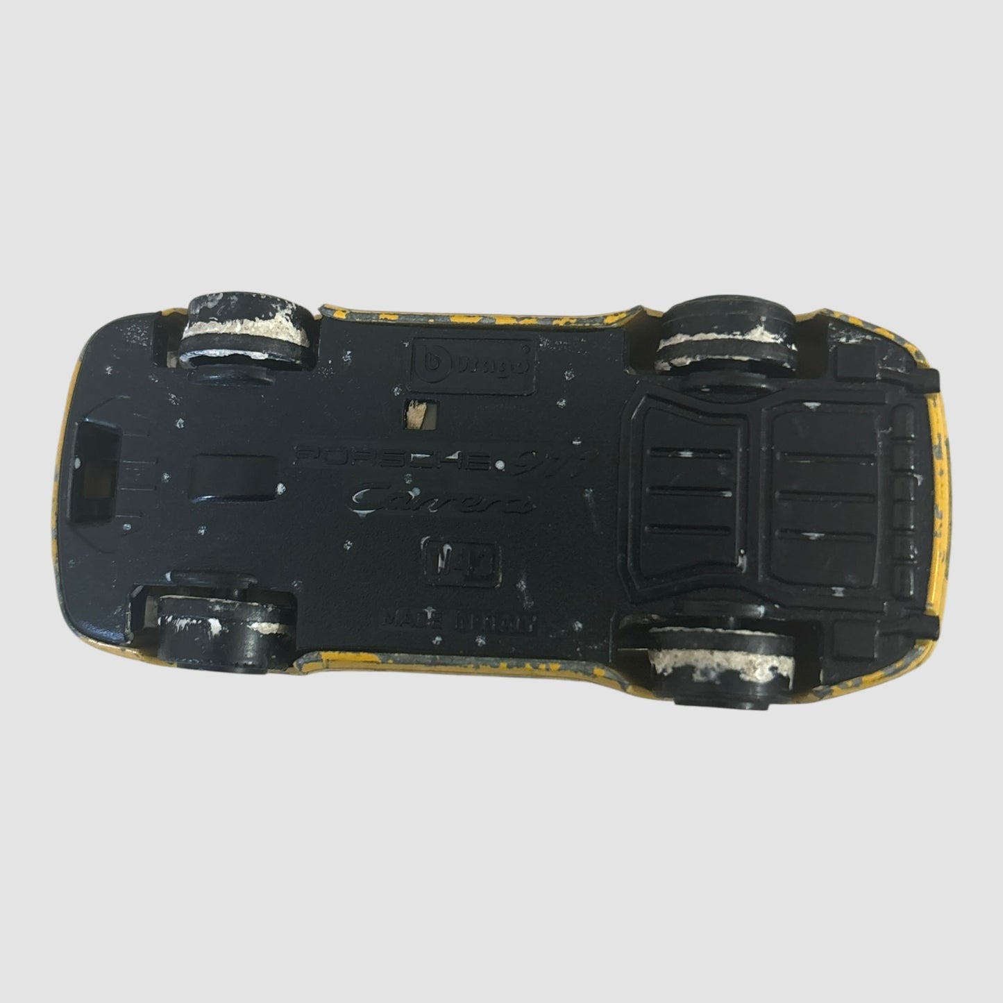 Bburago Porsche 911 Carrera miniatura amarela Shell