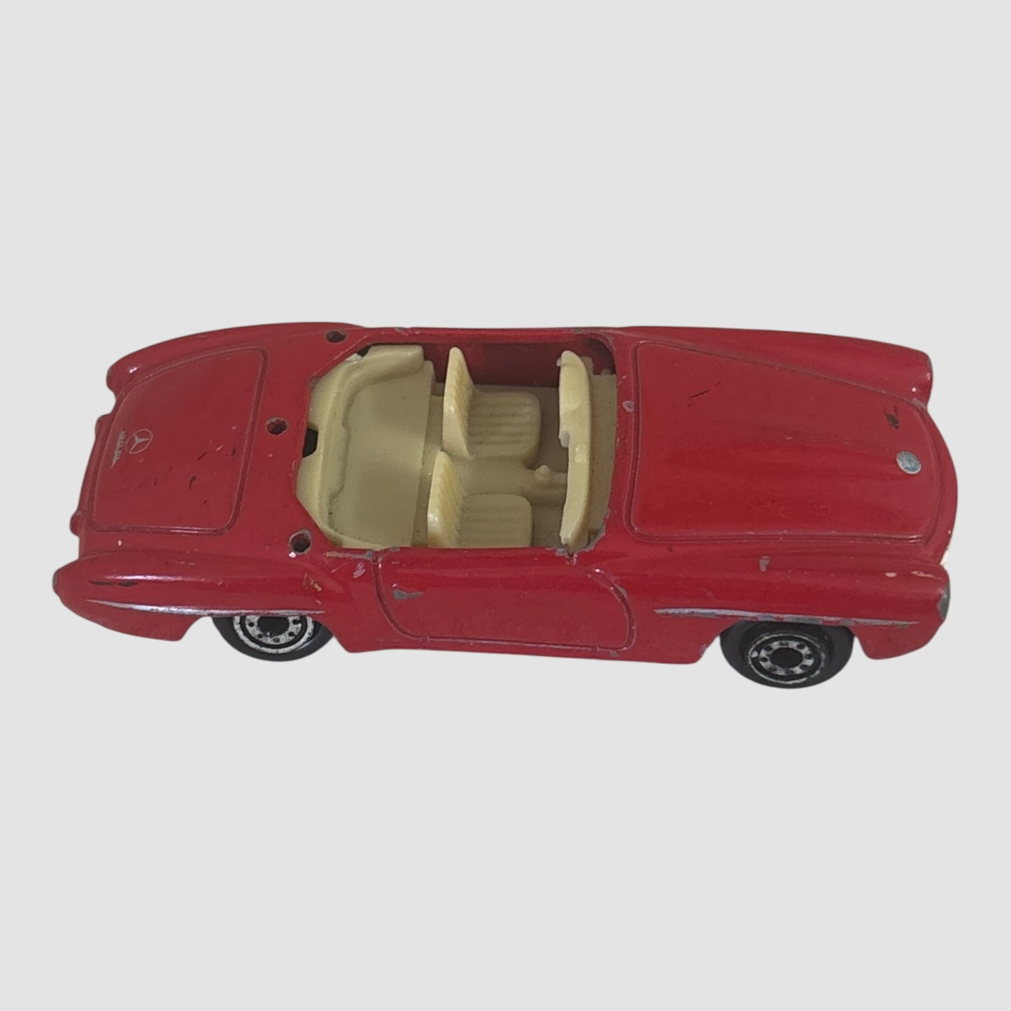 Miniatura carro descapotável clássico vermelho Welly