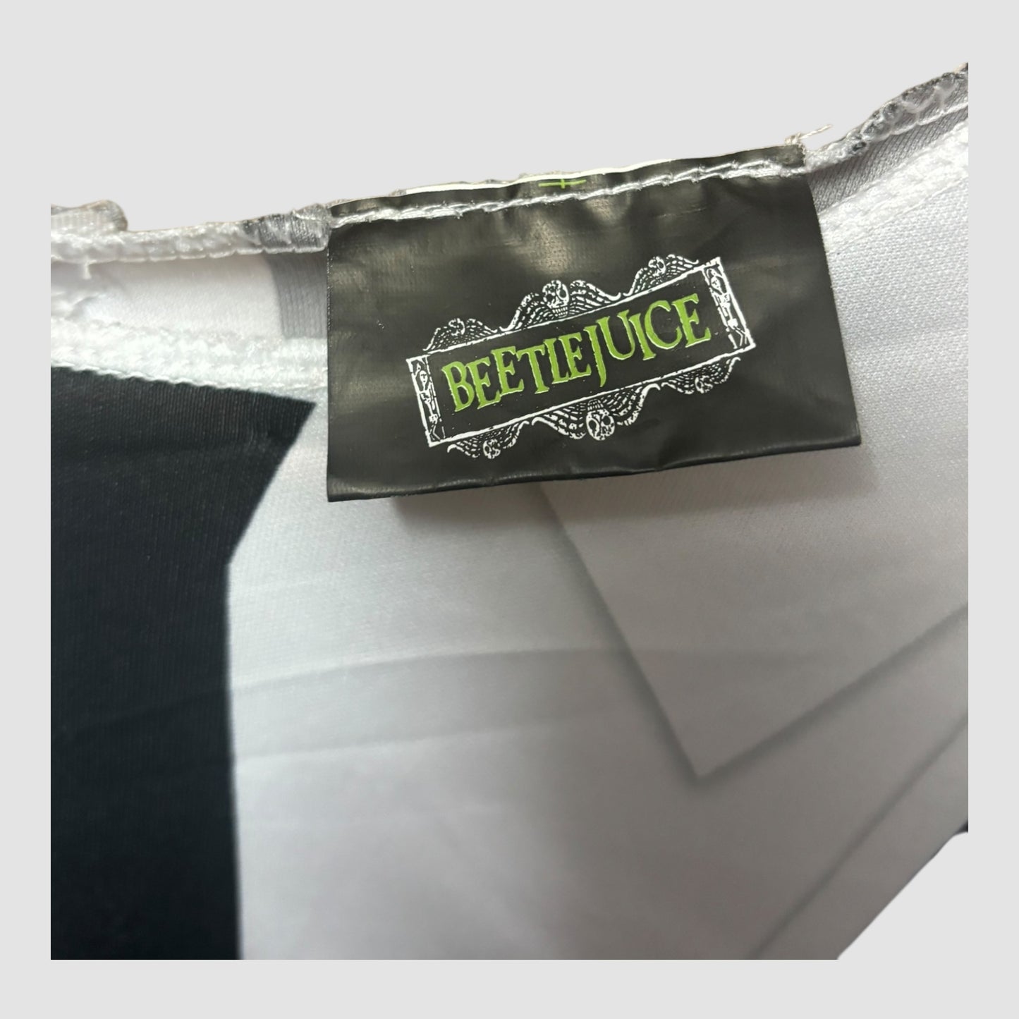 Fato Beetlejuice Adulto – Camisola e Calças às Riscas Preto e Branco (Oficial/Licenciado) Rubies